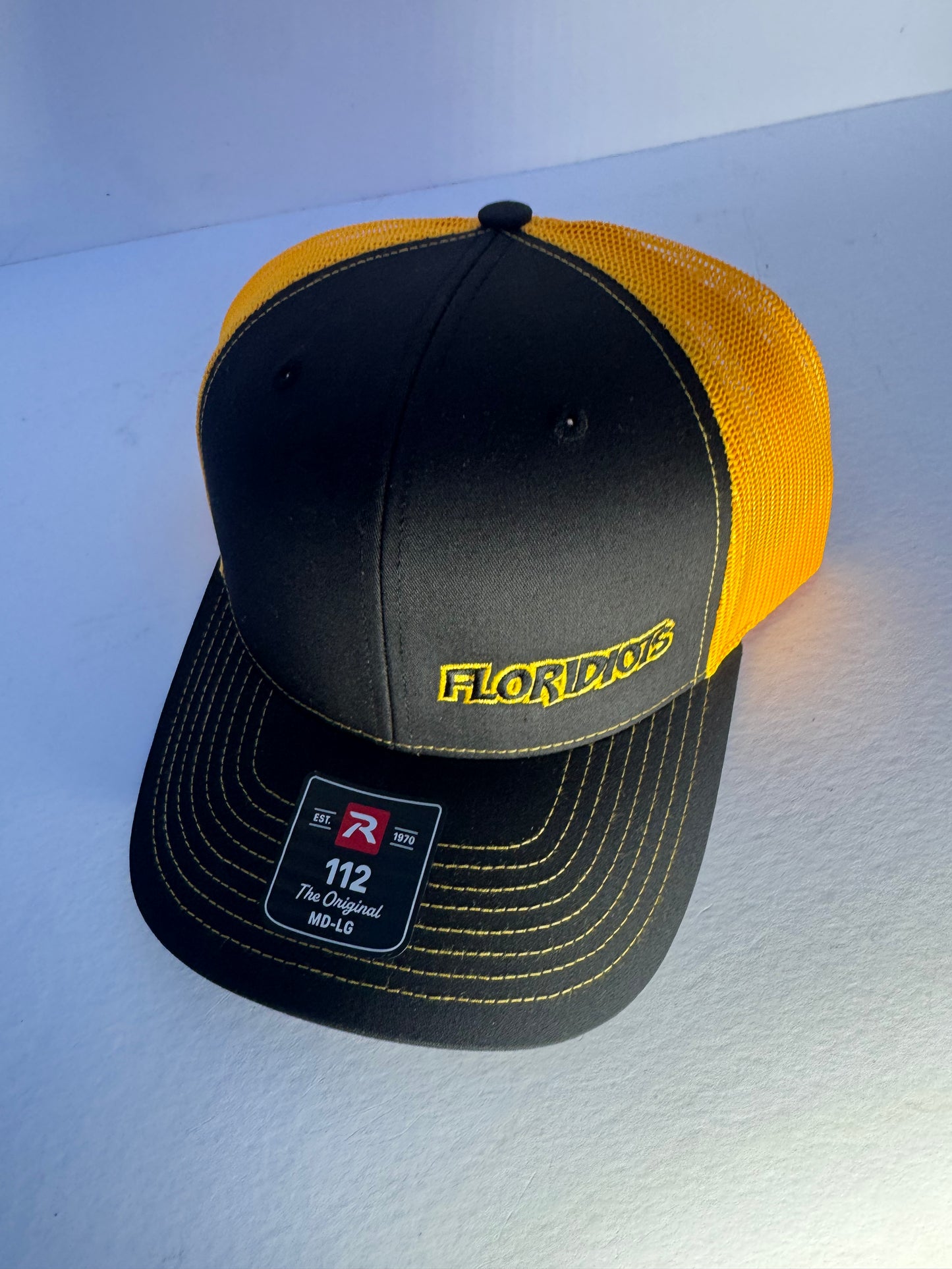 Gorra de camionero con la firma de Floridiots